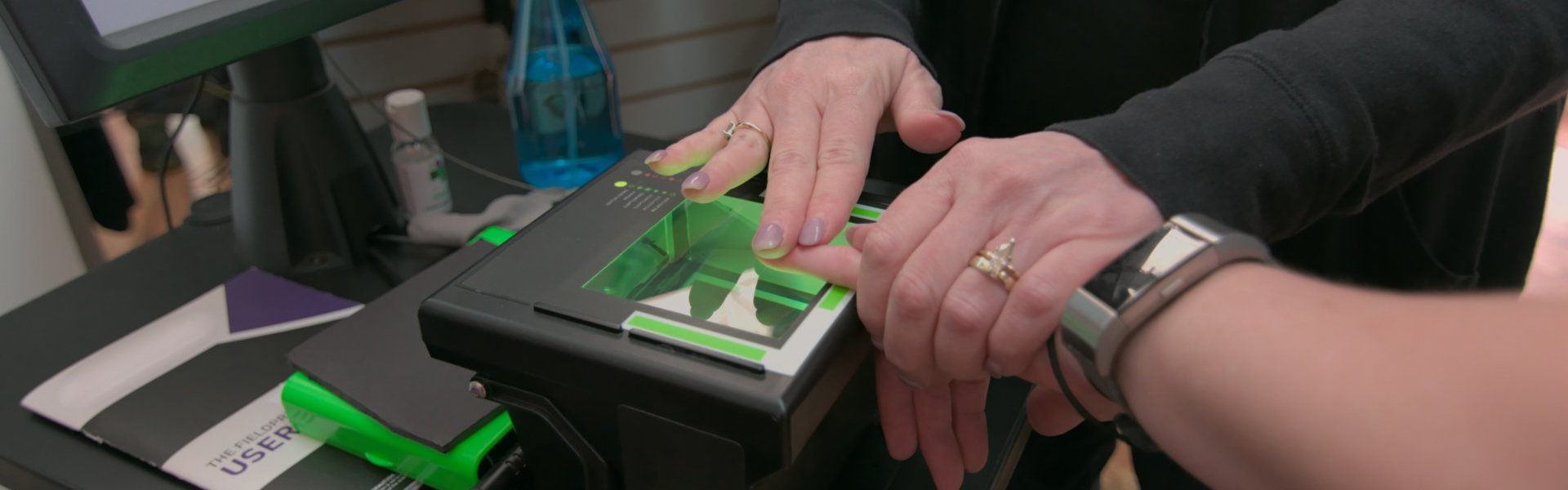 Man using a fingerprint scanner